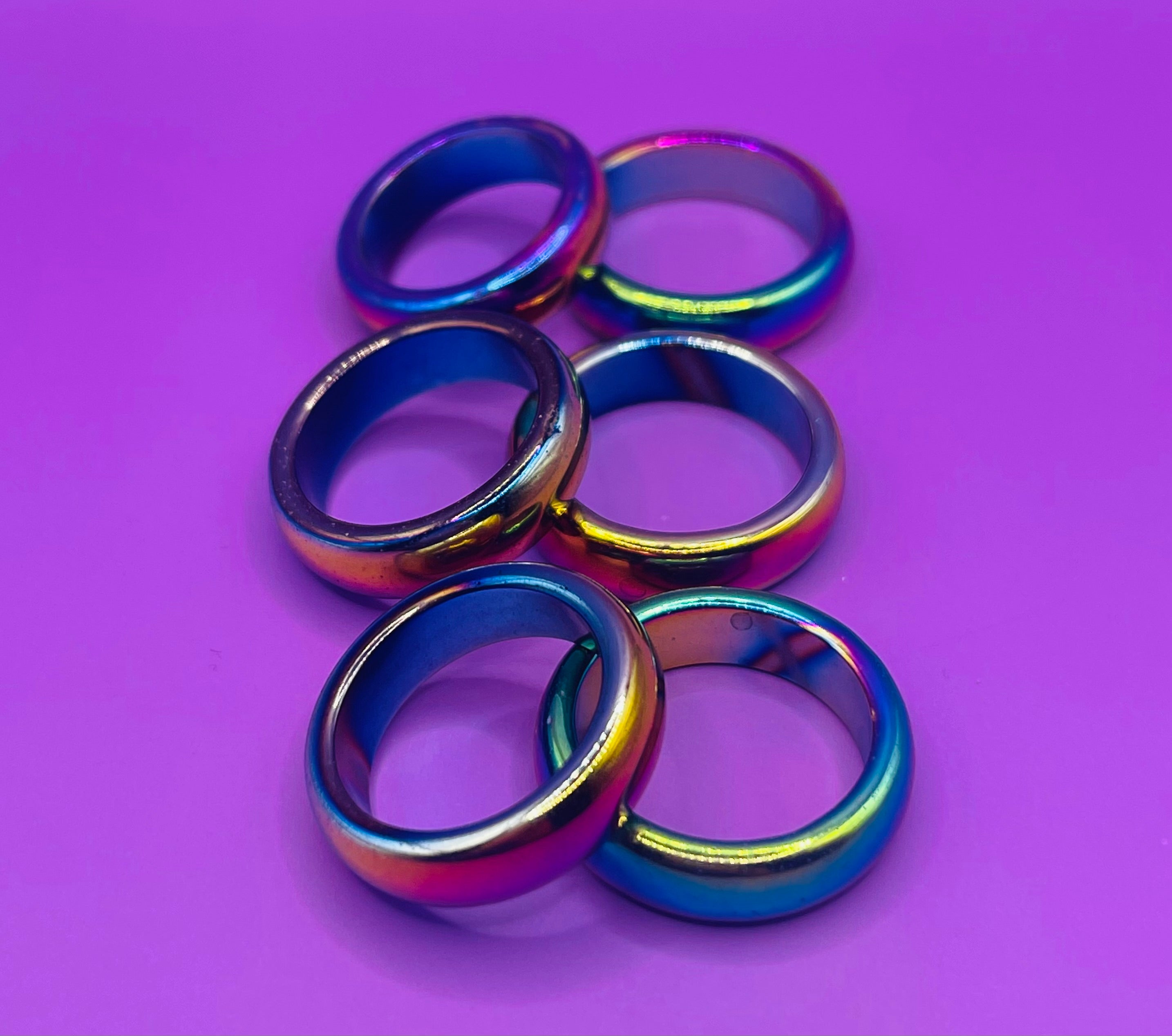 Rainbow hematite protection rings